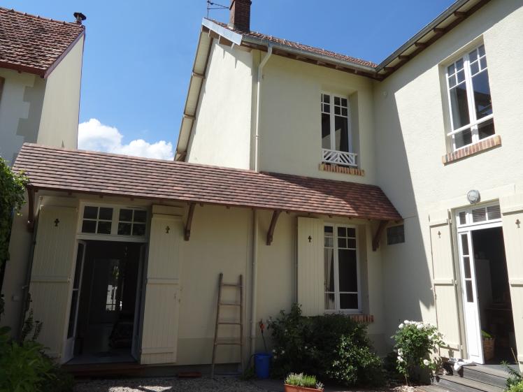 Façades sur jardin après travaux d'extension.