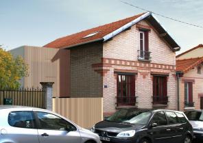 Rue de briques et cube de bois : extension d'une maison existante
