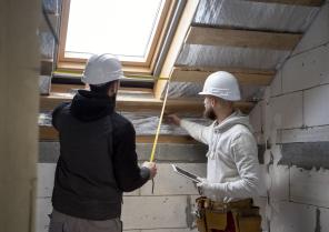 medium-shot-people-working-with-helmets