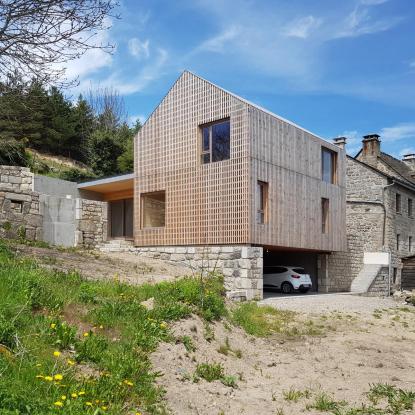 Maison sur la ruine Prix Bois