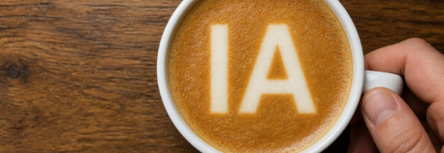 Tasse de café avec les lettres "IA" inscrites dans la mousse du café.